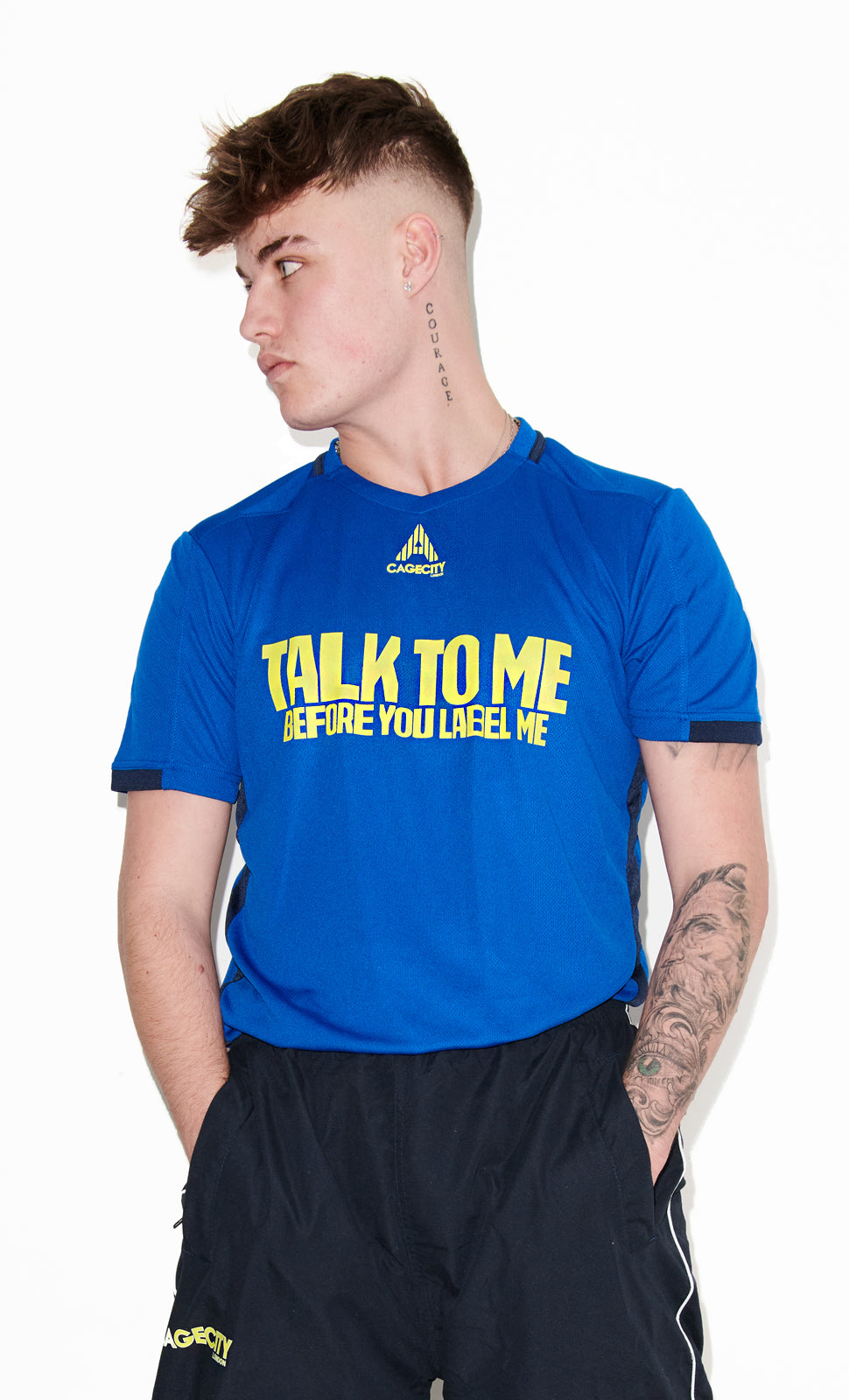 Talk To Me Before You Label Me Football Tee in Royal Blue