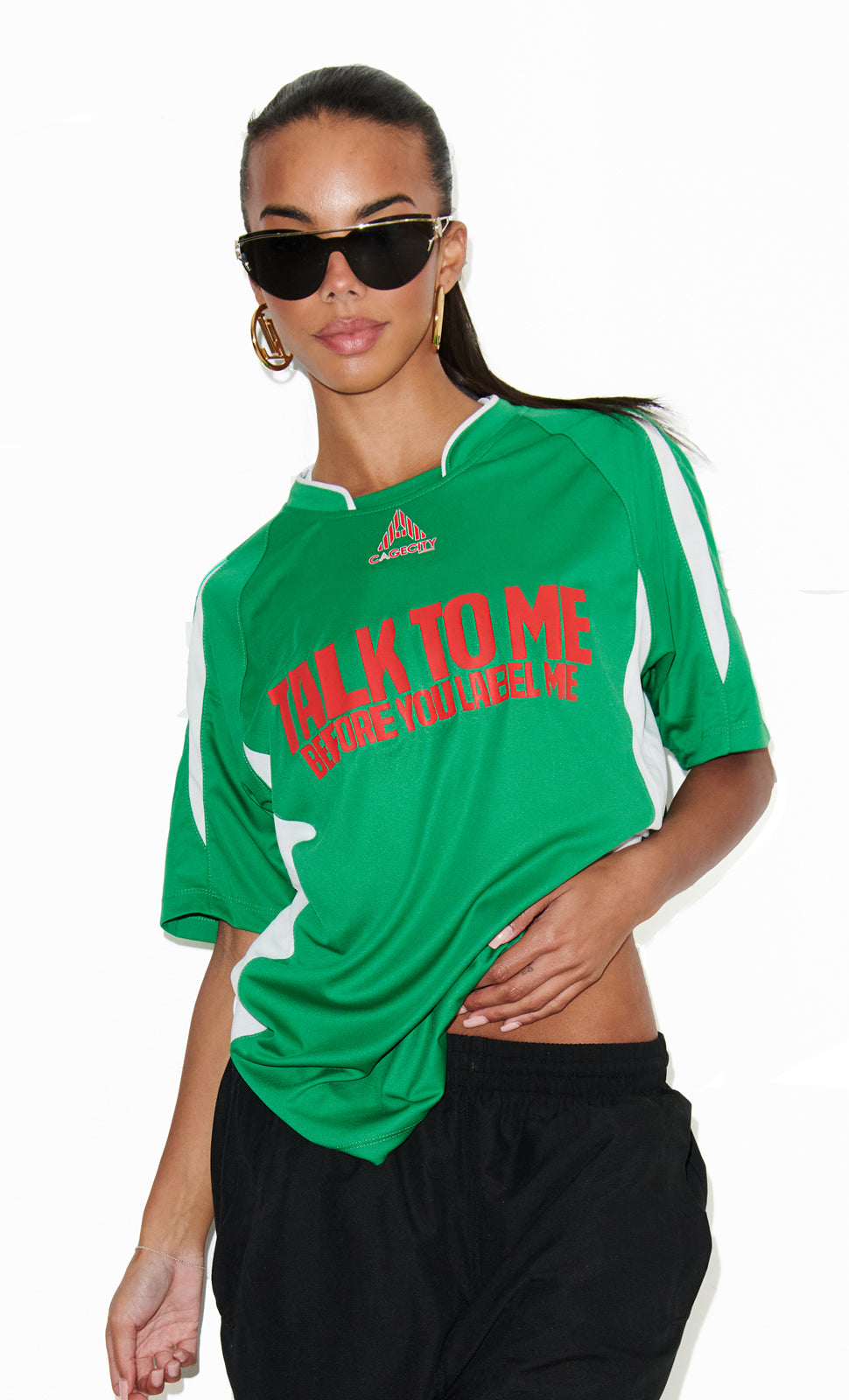 Talk To Me Before You Label Me Football Tee in Green and Red